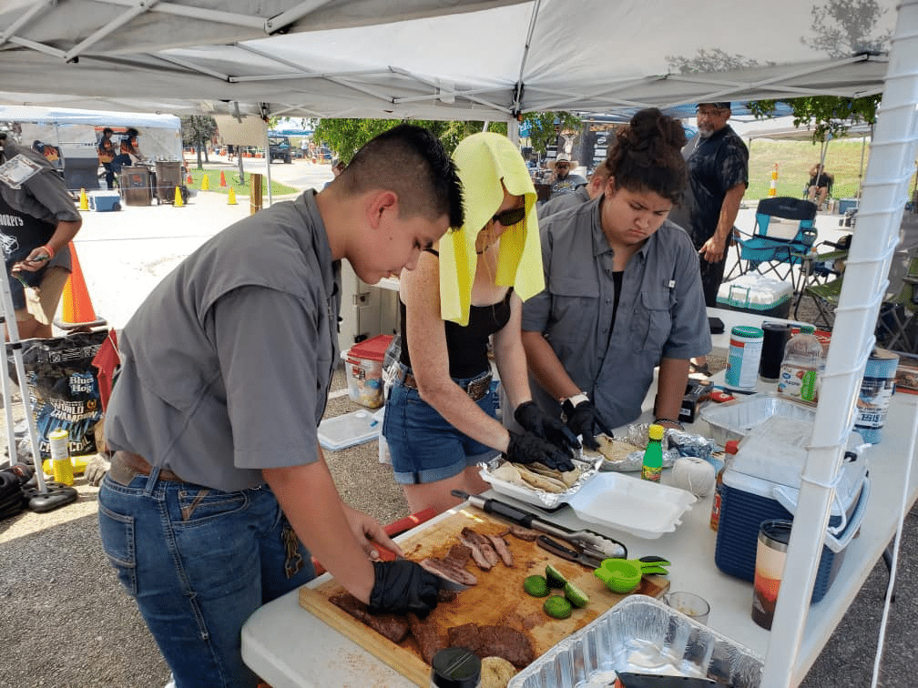 Students preparing dishes.