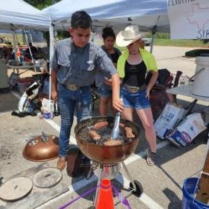 Students grilling food.