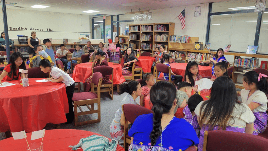 Students interacting with one another.