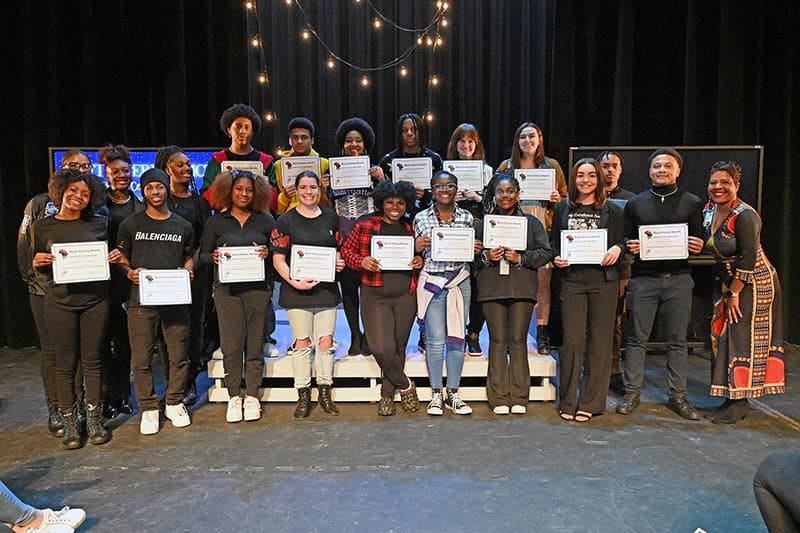 Students pose for group photo.