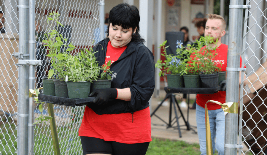Students helping in the garden.