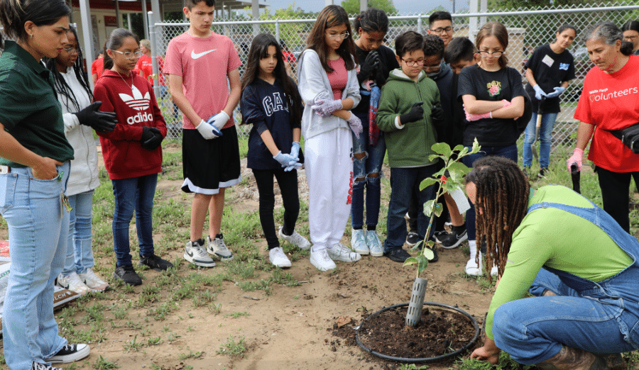 Group celebrating their garden.