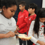 Students enhance their cooking skills.
