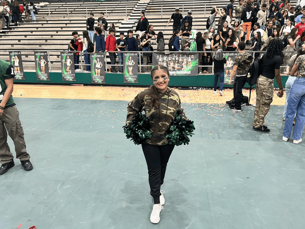 Senior posing at pep rally